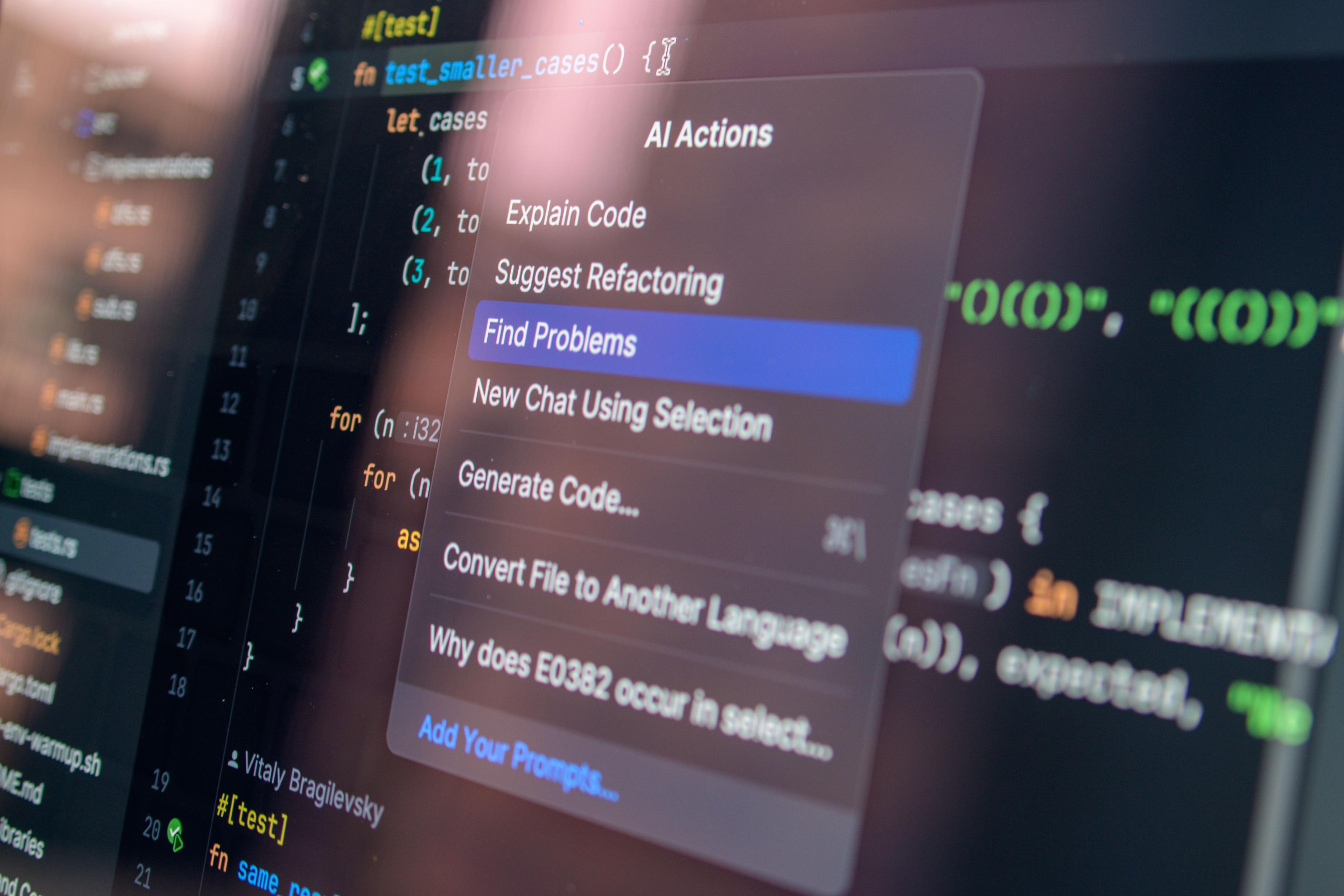 Pakistani software engineer coding in a modern editor on a DigiNeom-managed desk