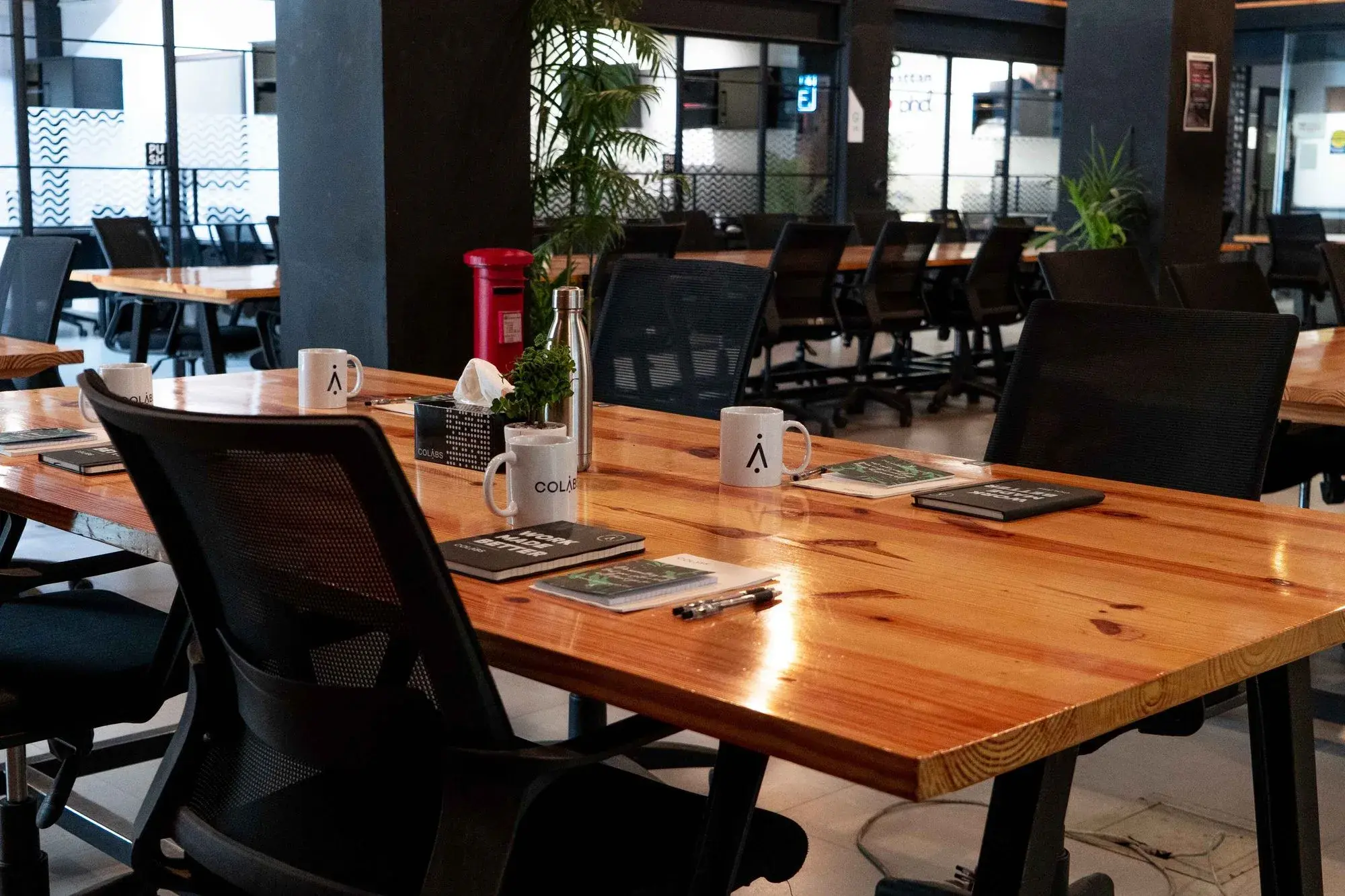 Pakistani engineers at desks in a DigiNeom-managed co-working floor